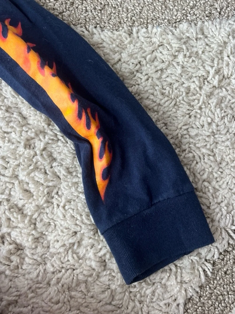 Vintage Nike Kids Navy Long Sleeve Tee with Flame 'Swoosh' Graphic